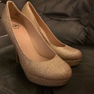 Gold Sparkle High Heels.